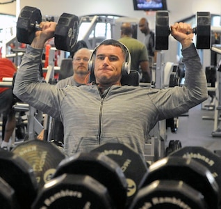 Army Staff Sgt.  Nicholas Reasons  lifts weights at the Rambler Fitness Center Feb. 15 at Joint Base San Antonio-Randolph.  (U.S. Air Force photo by Don Lindsey)