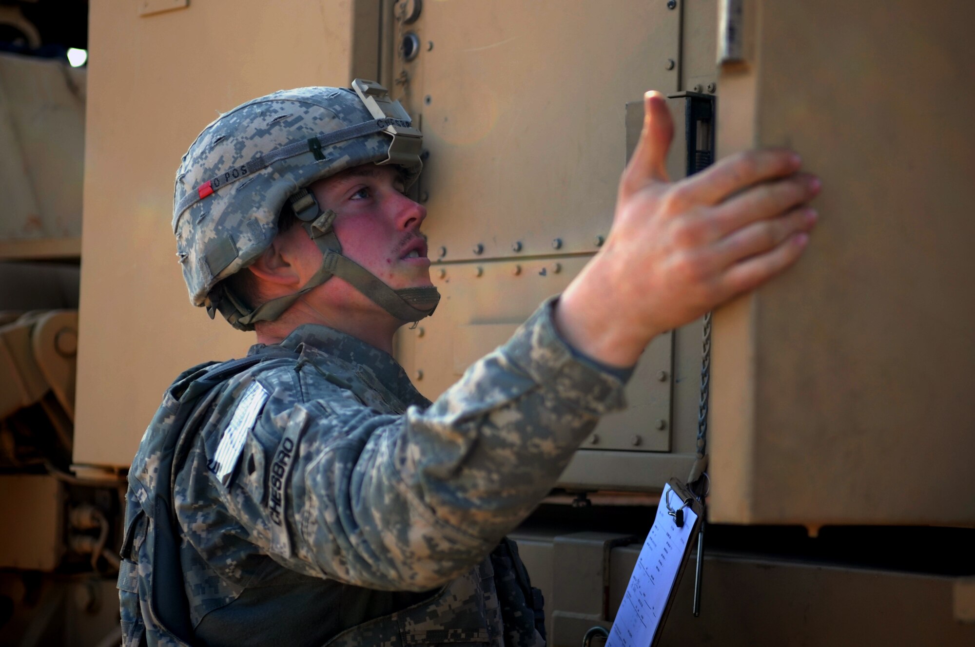 U.S. Army Spc. Charles Chesbro, 3rd Battalion, 2nd Air Defense Artillery Patriot launcher maintainer from Fort Sill, Okla., inspects the settings on a Patriot launching station Feb. 28, 2013, near Gaziantep, Turkey. Patriot batteries are deployed to Turkey as part of NATO’s commitment to Turkey’s security. (U.S. Air Force photo by Senior Airman Daniel Phelps/Released)