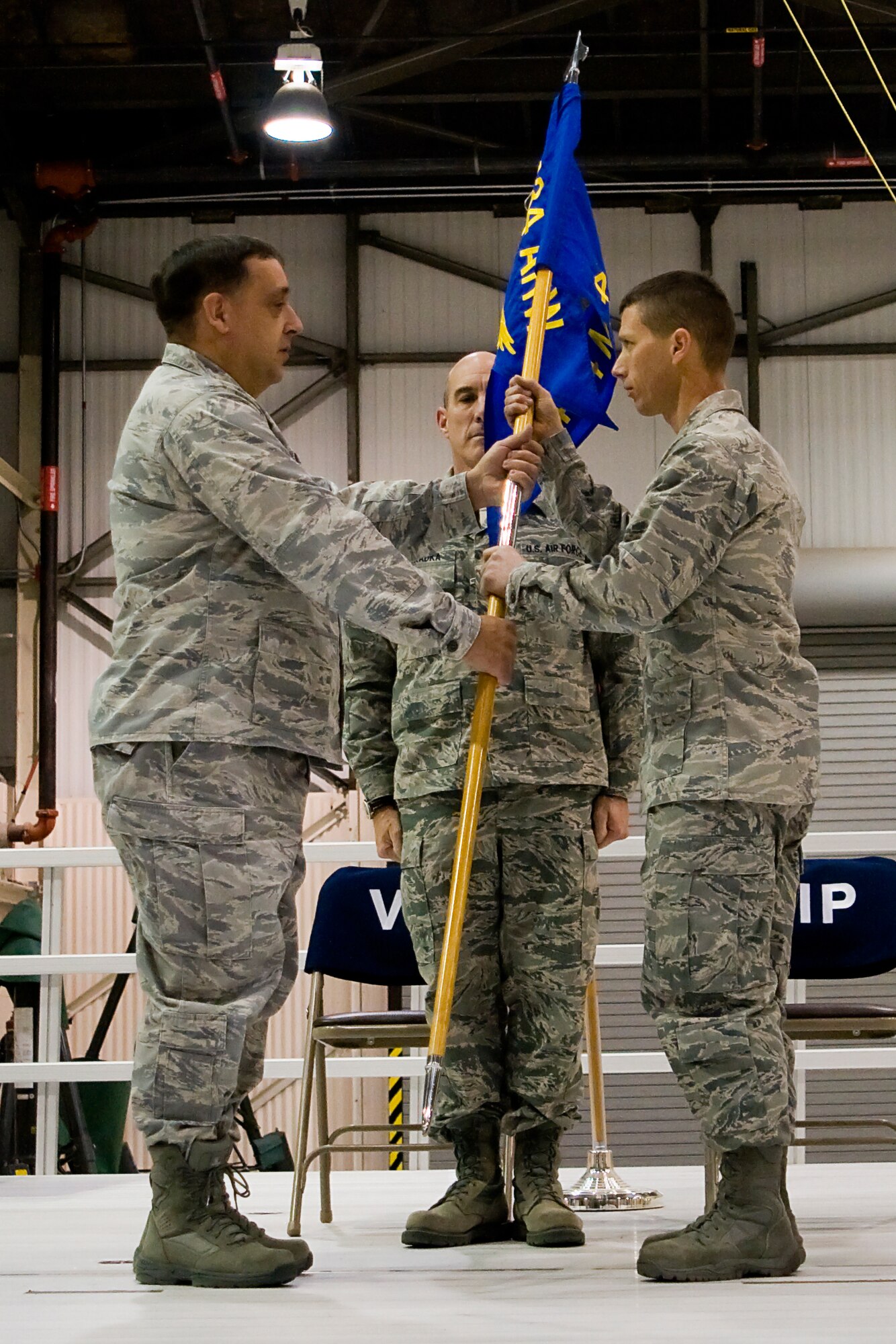 GRISSOM AIR RESERVE BASE, Ind. -- Col. Paul Weimer, 434th Maintenance Group commander, presents a 434th Maintenance Squadron guidon to Maj. William Chapman as the major took command of the unit during a change of command ceremony here recently. (U.S. Air Force photo/Staff Sgt. Ben Mota)