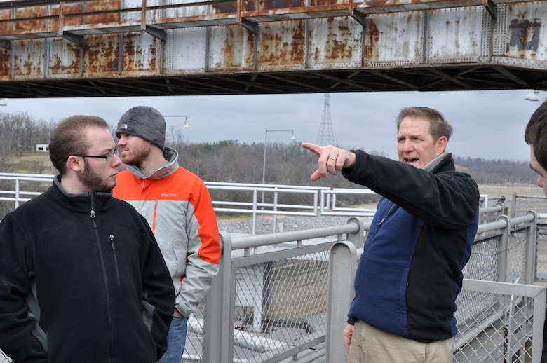 U.S. Army Corps of Engineer, Nashville District employee Michael Looney, Natural Resource Program Manager at the Lake Barkley Resource Center talks with students and faculty from University of Tennessee at Martin Hydrology and Hydraulics class about lock operations during a tour of the Lake Barkley Barkley lock and dam Feb. 28, 2013. (USACE Photo by Mark Rankin) 
