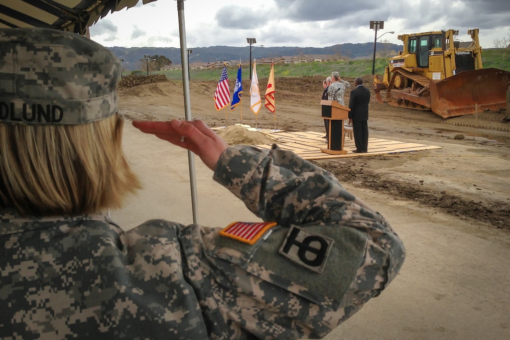 Chaplain (Capt.) Kerstin Hedlund salutes the flag during a groundbreaking ceremony March 6, 2013, at the U.S. Army Garrison Camp Parks Reserve training center in Dublin, Calif.
The U.S. Army Corps of Engineers Sacramento District's real estate office is overseeing a 180-acre transfer of land in exchange for an estimated $66 million in modern facilities for Camp Parks over the next several years—the largest Army Reserve real property exchange agreement in Department of Defense history.