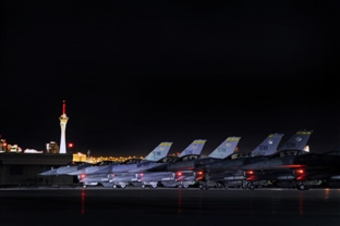 U.S. Air Force F-16 Fighting Falcon pilots await take off for a night mission during exercise Red Flag 13-3 on Nellis Air Force Base, Nev., Feb. 25, 2012. The pilots are assigned to the 79th Fighter Squadron.

