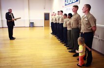 John Falkenbury, the USO of North Carolina president, speaks to Marines and sailors with Medical Logistics Company, 2nd Supply Battalion, 2nd Marine Logistics Group during an award ceremony at the USO in Jacksonville, N.C., March 7, 2013. The servicemembers spent several weeks constructing new shelving and reorganizing the facility’s storage area after the battalion donated more than 6,000 pounds of nonperishable food items.