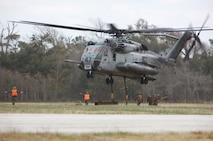 A CH-53E Super Stallion prepares to take off with a simulated cargo load during a field exercise held by Combat Logistics Battalion 6, 2nd Marine Logistics Group aboard Camp Lejeune, N.C., Feb. 28, 2013. The battalion used the exercise as a chance to familiarize some of its personnel with the basic procedures used during helicopter support missions. 