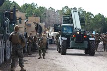 Marines with Combat Logistics Battalion 6, 2nd Marine Logistics Group prepare to embark on a convoy aboard Camp Lejeune, N.C., Feb. 28, 2013. The unit launched nine vehicles from its main staging area to clear a route to a landing zone in support of a helicopter training mission.