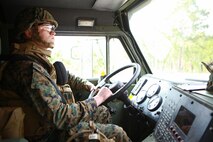 Lance Cpl. Justin T. Barrett, a motor transportation operator with Combat Logistics Battalion 6, 2nd Marine Logistics Group, and native of Byron, N.Y., operates a Logistics Vehicle System Replacement during a convoy aboard Camp Lejeune, N.C., Feb. 28, 2013. Barrett joined 30 other Marines with the battalion for the convoy, which introduced the servicemembers to the basics of conducting landing zone security and helicopter support missions.