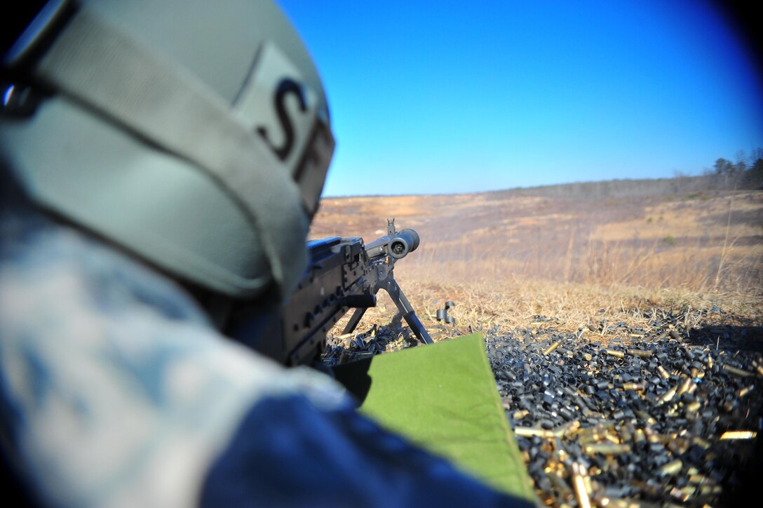 Air Force Staff Sgt. Robert Wilson, A security forces airman with 11th Security Forces Squadron, engages distant targets with an M240B medium machine gun during predeployment qualification excersise at Range 5 on March 4. The M240B provides superior firepower to units across the U.S. armed forces.
