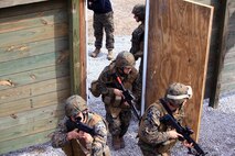 Marines with Engineer Operation Company, Marine Wing Support Squadron 274, out of Marine Corps Air Station Cherry Point, N.C., breach a room aboard Camp Lejeune, N.C., Feb. 27, 2013, during a week-long training period at the Battle Skills Training School. Servicemembers with the company learned how to breach and clear rooms, and then later that day performed practical applications on simulated rooms. 