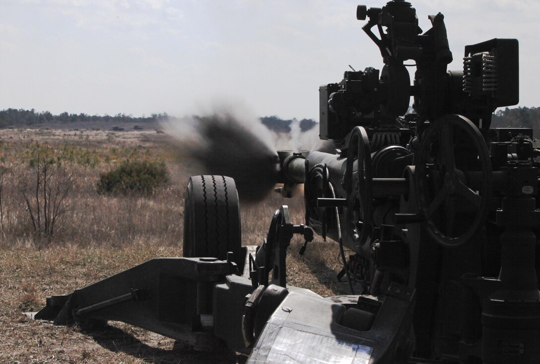 Marines and sailors with 3rd Battalion, 10th Marine Regiment, 2nd Marine Division, conducted a live-fire training exercise with M777A2 155 mm howitzers March 6-8, 2013, aboard Marine Corps base Camp Lejeune. Marines with India Battery shoot rounds down range at a simulated tank target.