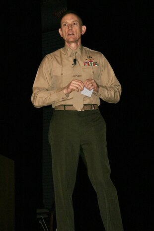Brig. Gen. Frank Kelley, commander, Marine Corps Systems Command, speaks to MCSC employees during a command town hall March 8 covering the sequestration and possible furlough. 