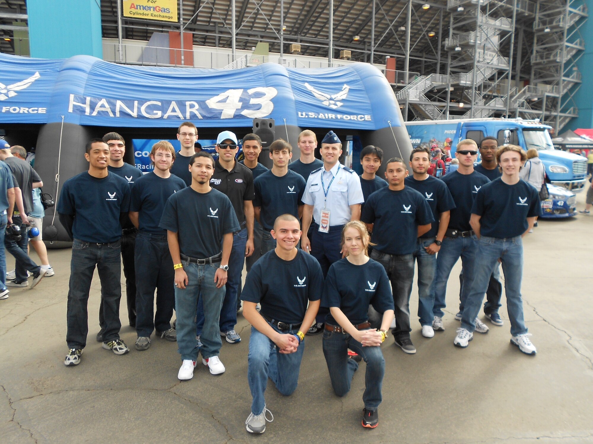 Chaplain Kevin Rash, 944th Fighter Wing, swore in 16 new recruits in front of thousands of NASCAR fans during the Subway Fresh Fit 500 NASCAR Sprint Cup Series at the Phoenix International Raceway Sunday. (Courtesy Photo)