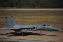 A U.S. Air Force F-15C Eagle prepares for flight operations during Cope Tiger 13 at Korat Royal Thai Air Force Base, Thailand, March 12, 2013.  Cope Tiger is an annual multilateral exercise designed to improve readiness and cooperation between U.S., Thai and Singaporean forces. (U.S. Air Force photo/2nd Lt. Jake Bailey) 