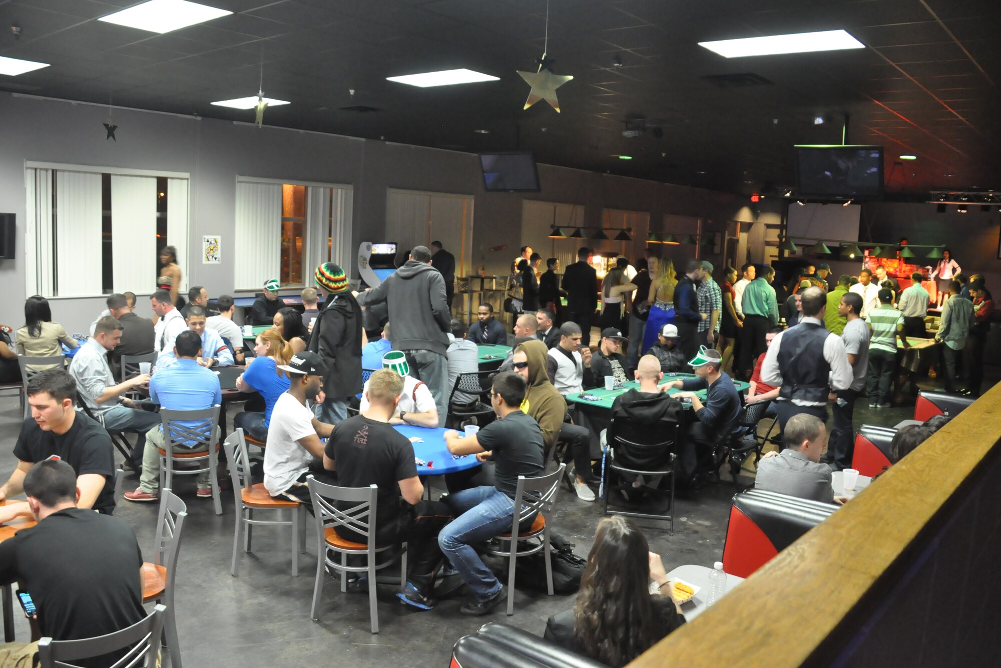 Hurlburt Airmen compete in various casino-themed activities during the complimentary Casino Royale Food Drive at the Landing Zone at Hurlburt Field, Fla., March 9, 2013. The event raised more than 300 pounds of canned goods for families in need in the local community. (Courtesy photo by Senior Airman Brandon Gilliatt)  