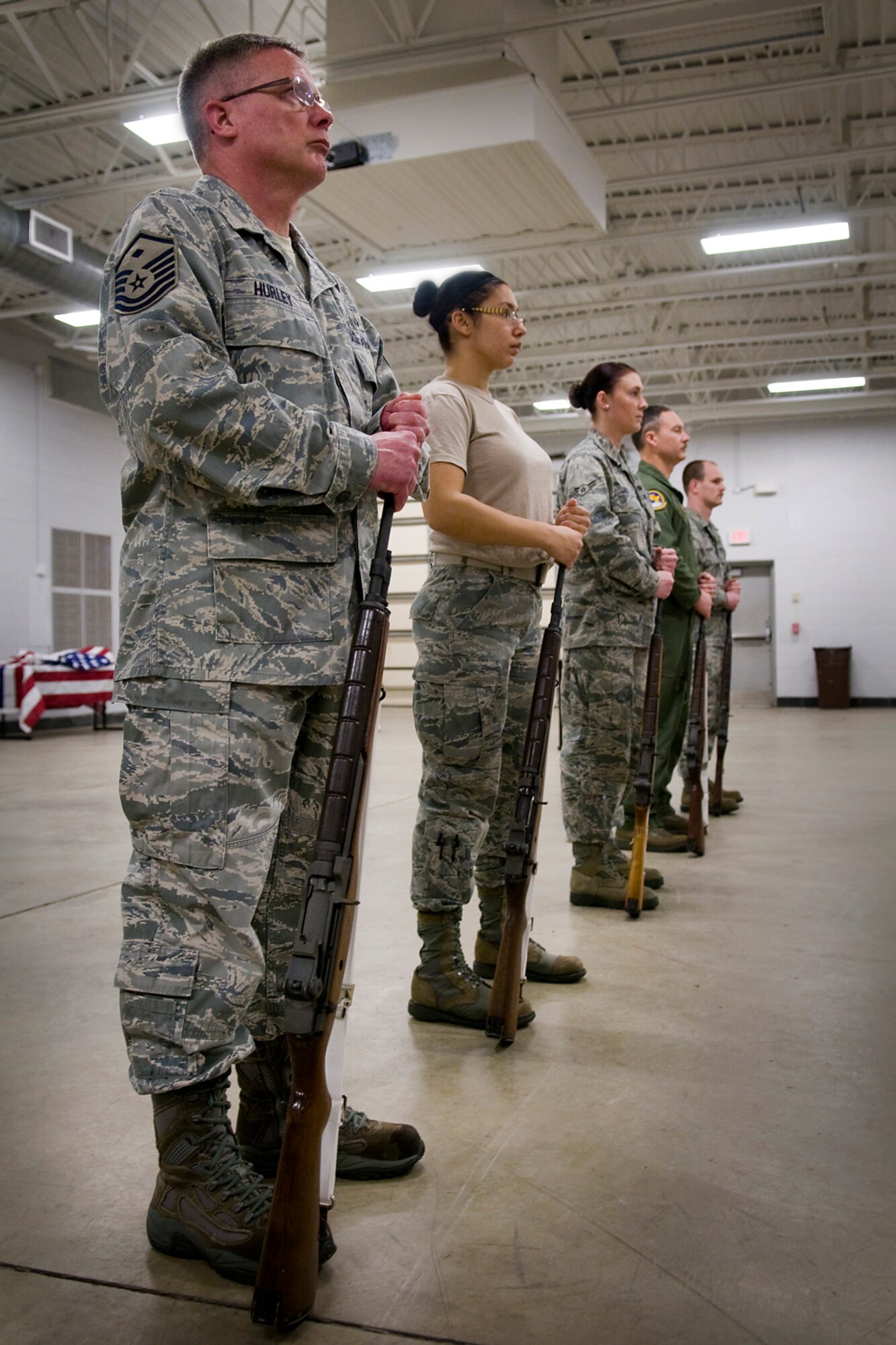 GRISSOM AIR RESERVE BASE, Ind. -- Grissom ceremonial guardsmen participate in a firing party exercise during an honor guard training here March 6. Ceremonial guardsmen have a unique role of providing final military honors to a deceased veteran, retiree or active-duty Airman along with honoring the nation and its flag through special ceremonies at schools, churches, sporting venues and other special events. (U.S. Air Force photo/Tech. Sgt. Mark R. W. Orders-Woempner)
