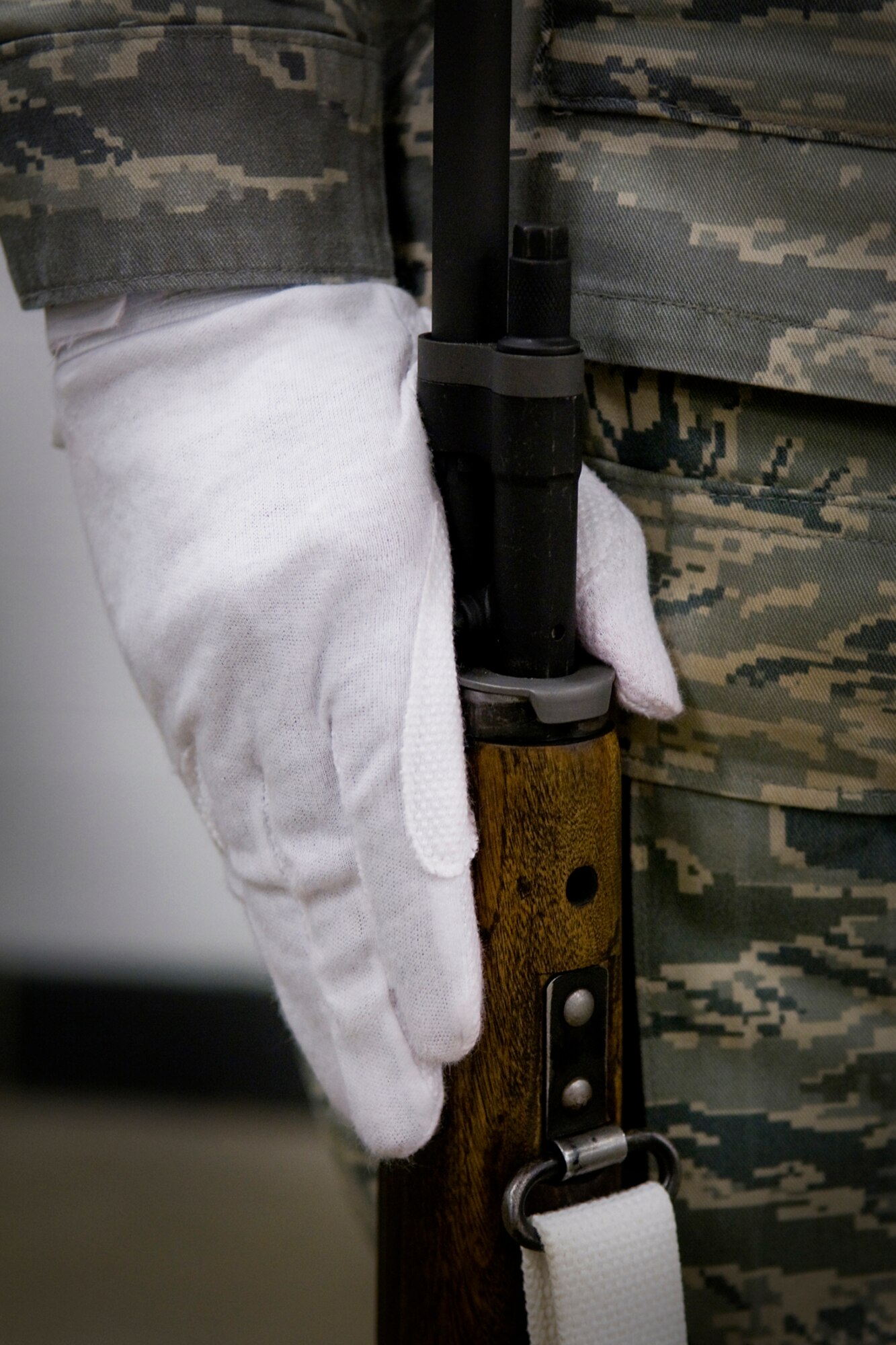GRISSOM AIR RESERVE BASE, Ind. -- A Grissom ceremonial guardsman pins a rifle to his leg during honor guard training here March 6. The week-long training included instruction on honor guard facing movements, flag folding, casket bearing and weapons. (U.S. Air Force photo/Tech. Sgt. Mark R. W. Orders-Woempner)
