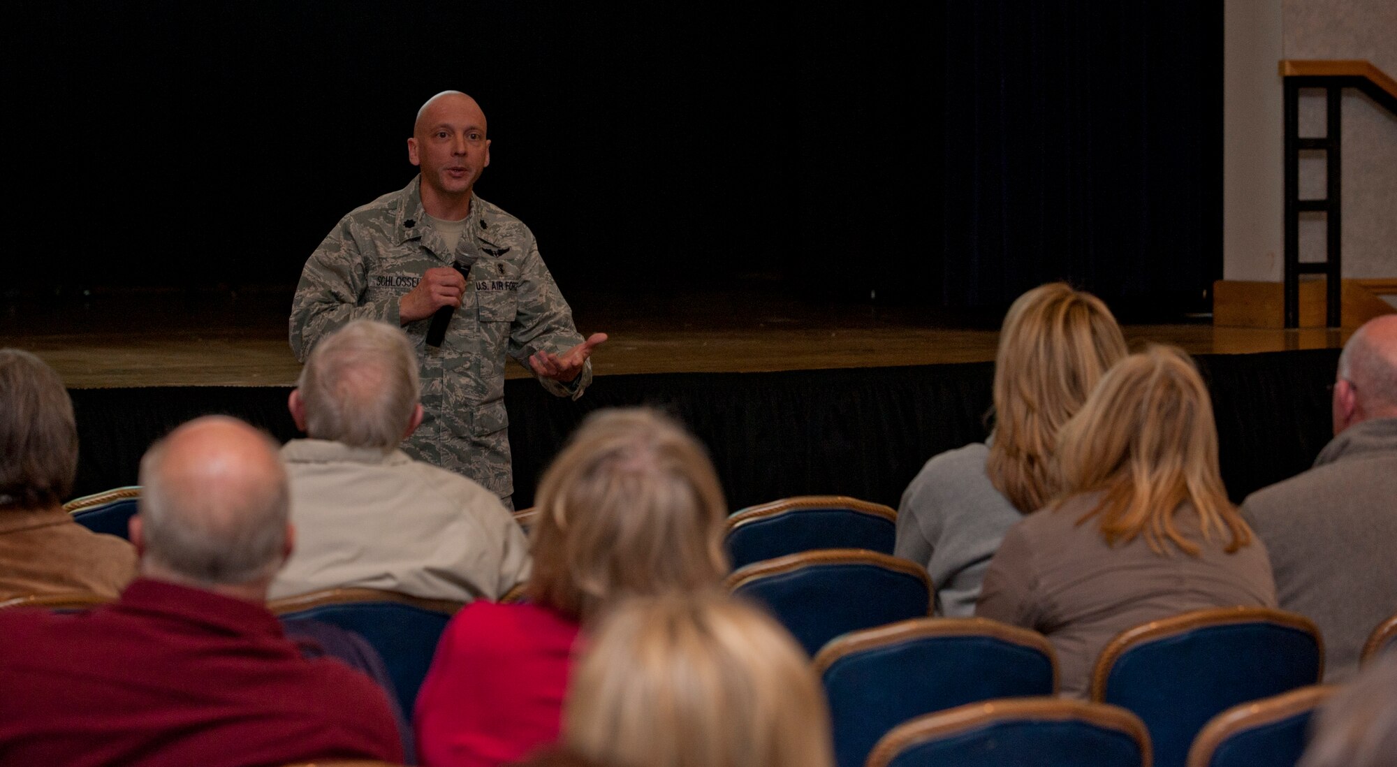 Lt. Col. Francis Schlosser, 22nd Medical Operations Squadron commander, explains his squadron’s mission to a crowd at the 22nd Air Refueling Wing Health Care Forum March 7, 2013, McConnell Air Force Base, Kan. Schlosser, along with other squadron commanders, took questions from the crowd and helped clarify the 22nd Medical Group’s goals during the quarterly forum. (U.S. Air Force photo/Airman 1st Class Victor J. Caputo)