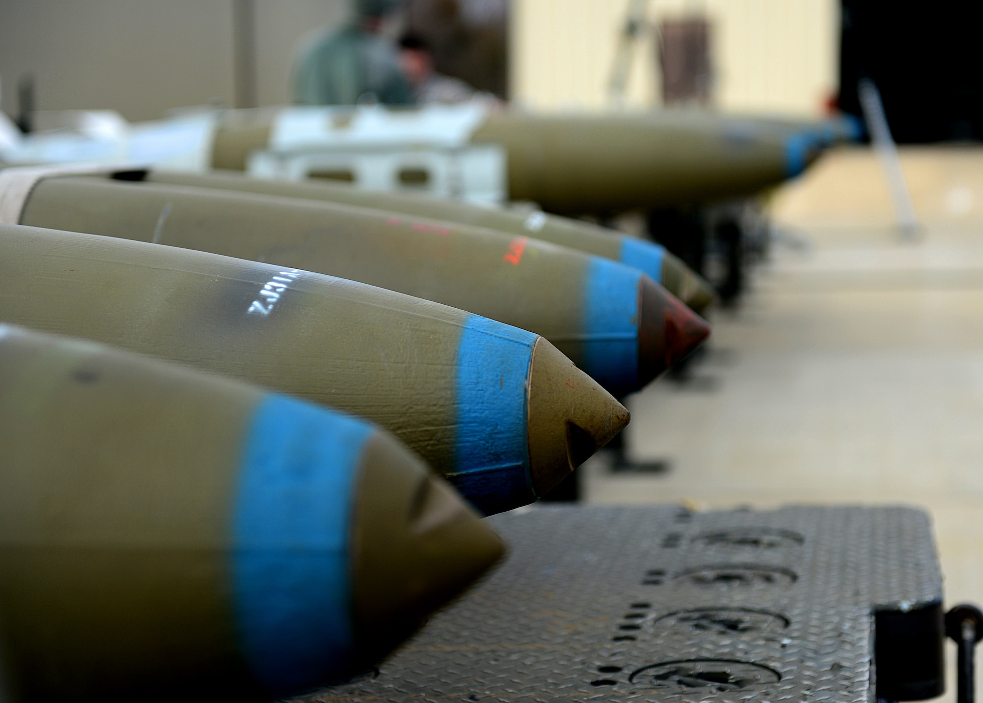 A row of Guided Bomb Unit 32s lie on a munitions assembly conveyer at Langley Air Force Base, Va., March 5, 2013. The productions section of the Munitions Flight is responsible for providing munitions to the flight line. (U.S. Air Force photo by Senior Airman Kayla Newman/Released)