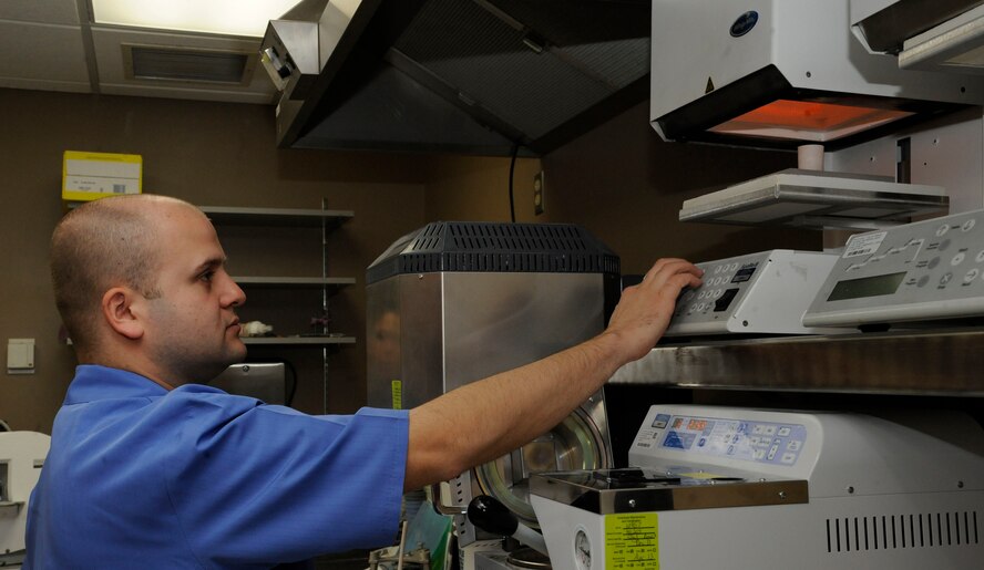 Staff Sgt. Christopher Casey, 2nd Dental Squadron dental lab assistant, casts a metal substructure on Barksdale Air Force Base, La., March 12. The substructure is fused to a crown and helps support it when it is applied to a patient's tooth. (U.S. Air Force photo/Airman 1st Class Andrew Moua)