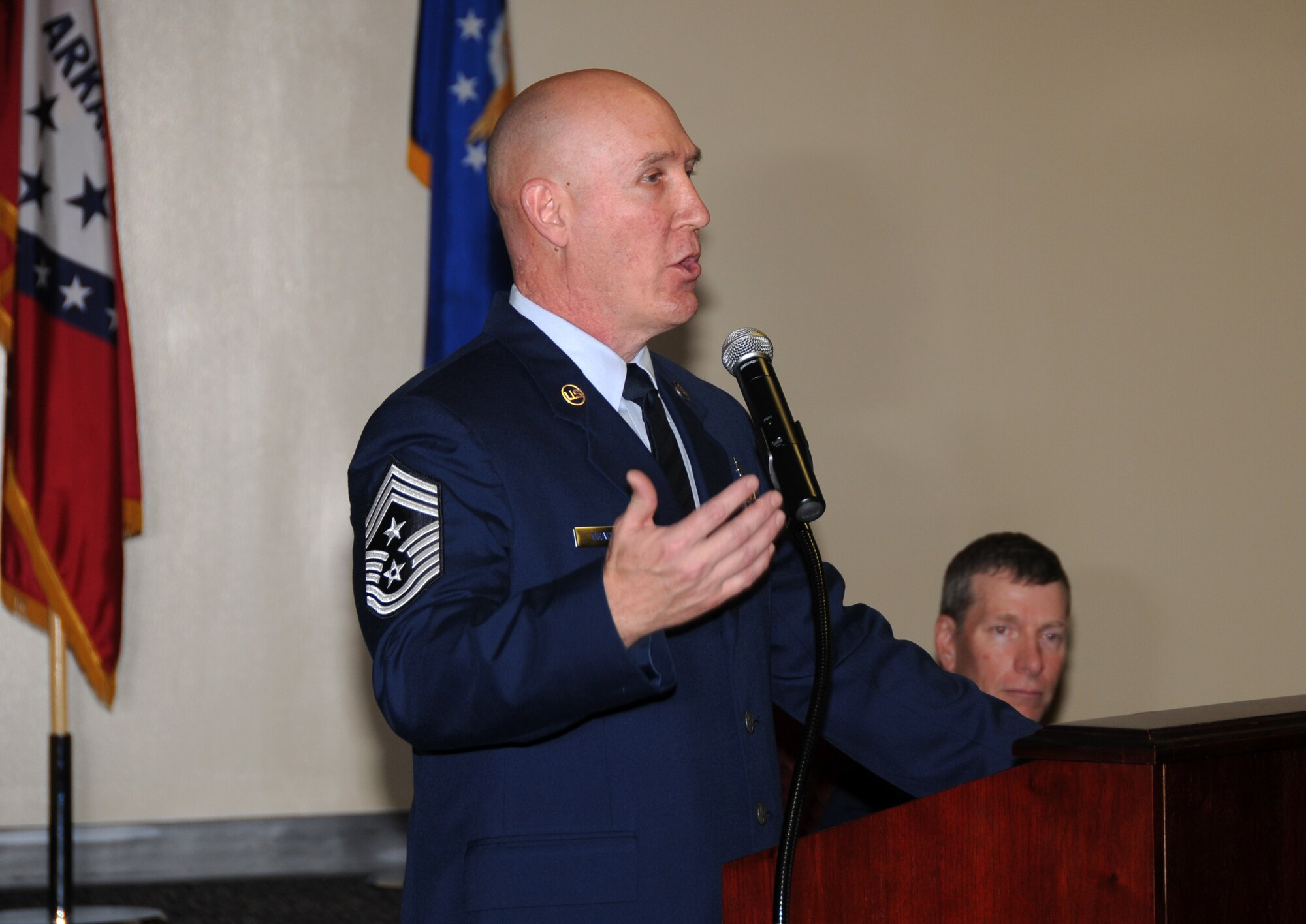 Chief Master Sgt. Stephen Bradley, 188th Fighter Wing command chief, delivers a speech at a command chief change of authority ceremony March 3, 2013, at the 188th. Chief Master Sgt. Asa Carter relinquished authority to Bradley during the ceremony. Carter moves on to become the Arkansas Air National Guard’s state command chief. (National Guard photo by Senior Airman John Hillier/188th Fighter Wing Public Affairs)