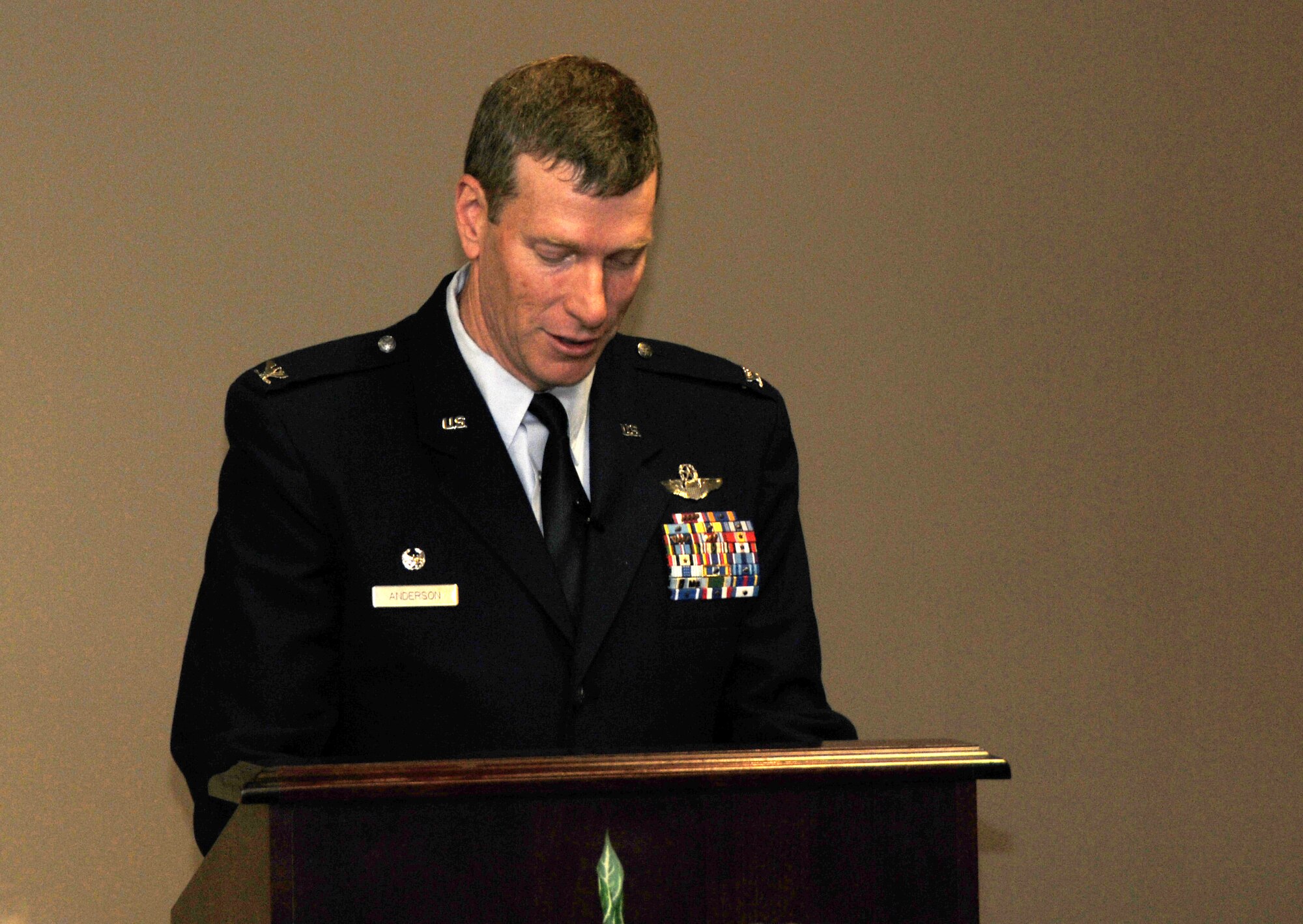 Col. Mark Anderson, 188th Fighter Wing commander, delivers a speech at a command chief change of authority ceremony March 3, 2013, at the 188th. Chief Master Sgt. Asa carter relinquished authority to Chief Master Sgt. Stephen Bradley during the ceremony. Carter moves on to become the Arkansas Air National Guard’s state command chief. (National Guard photo by Senior Airman John Hillier/188th Fighter Wing Public Affairs)