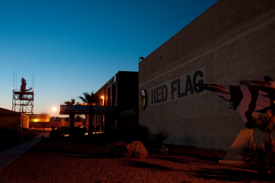 The sun sets on the Red Flag compound on Nellis Air Force Base, Nev., Feb. 28, 2013. Intelligence, Surveillance and Reconnaissance warriors from the 526th Intelligence Squadron, along with more than two dozen augmentees from across the Air Force ISR Agency, fully participated in Red Flag 13-3 Feb. 25 to March 15, 2013.  They brought real-time ISR capabilities for the first time ever to the Air Force's premiere aerial warfare exercise. (U.S. Air Force photo/Maj. Christian P. Hodge)
