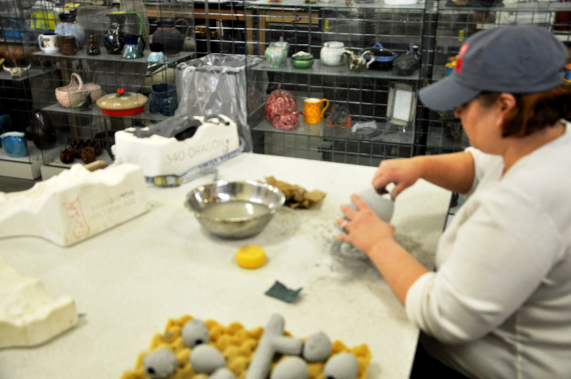 GOODFELLOW AIR FORCE BASE, Texas - A woman participates in ceramic art at the Arts and Crafts Center here. March is National Arts and Crafts month and the Arts and Crafts Center offers a variety of activities to celebrate. (U.S. Air Force photo/ 1st Lt. Leanne Hedgepeth)