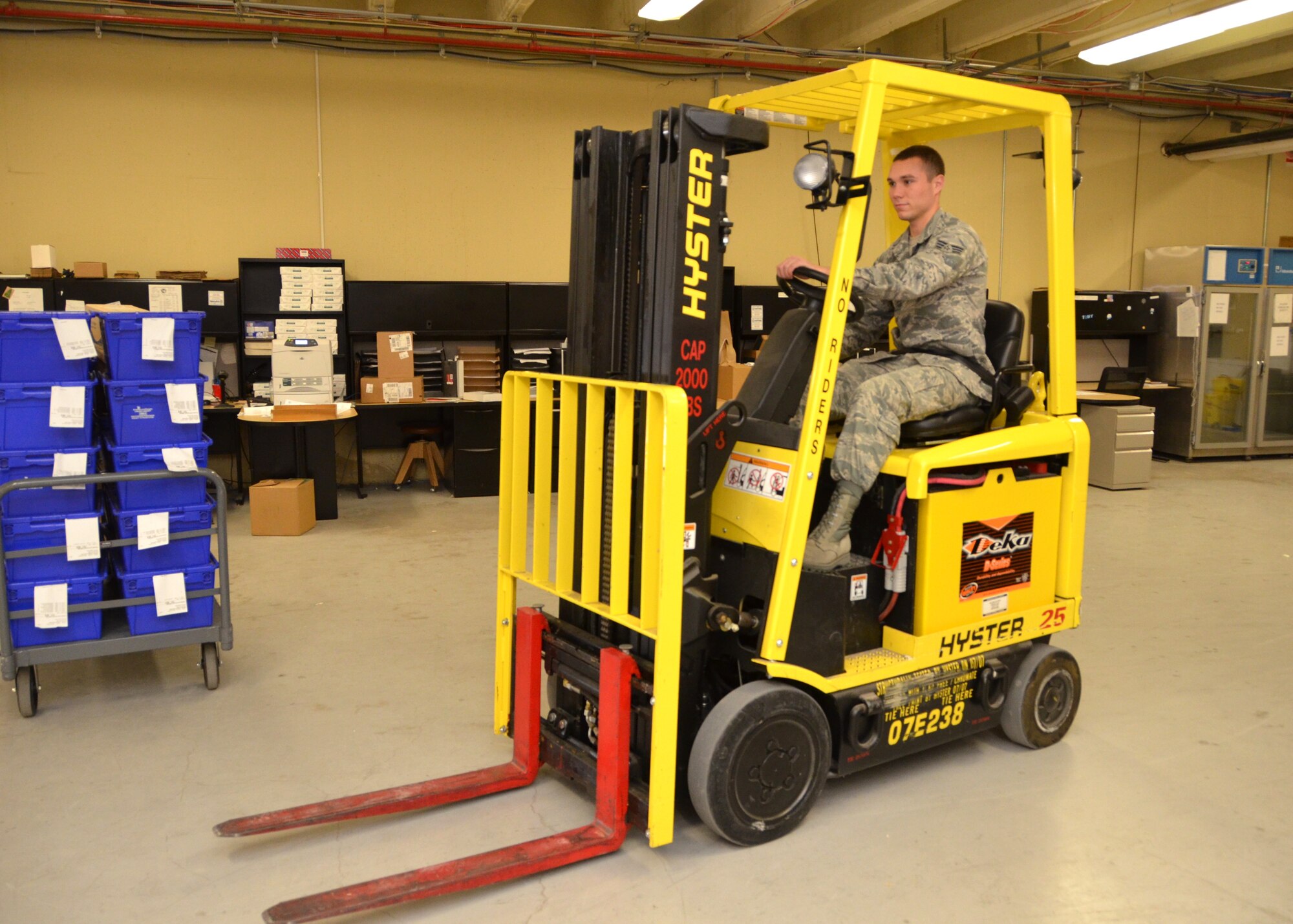 Senior Airman Zachary Bartlett, 81st Medical Support Squadron logistics technician, maneuvers a forklift in the Keesler Medical Center medical logistics warehouse Jan. 17, 2013, at Keesler Air Force Base, Miss.  Bartlett was named Keesler Air Force Base Airman of the Year during the wing’s annual awards banquet held March 1 at the Bay Breeze Event Center.  He also was selected as 2nd Air Force Airman of the Year, and will compete at the Air Education and Training Command 12 Outstanding Airmen of the Year category next.  (U.S. Air Force photo by Steve Pivnick)