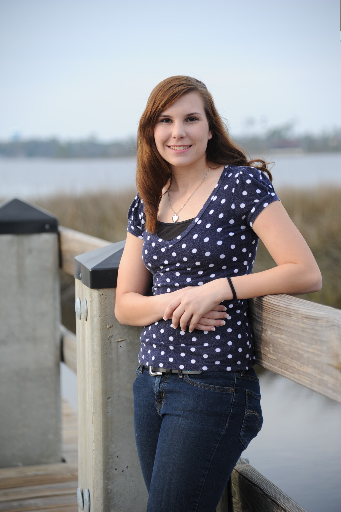 Azalee McAlpine, daughter of Eleanor and Lt. Col. Brad McAlpine, 335th Training Squadron commander, poses for a photo at the Keesler Marina March 8, 2013, Keesler Air Force Base, Miss.  She was a top-five Air Force finalist for the Military Child of the Year Award.  The award is sponsored by Operation Homefront, a nonprofit organization that provides assistance to military families, and recognizes military children who have demonstrated themselves as exceptional citizens while facing the challenges of military family life.  (U.S. Air Force photo by Kemberly Groue)