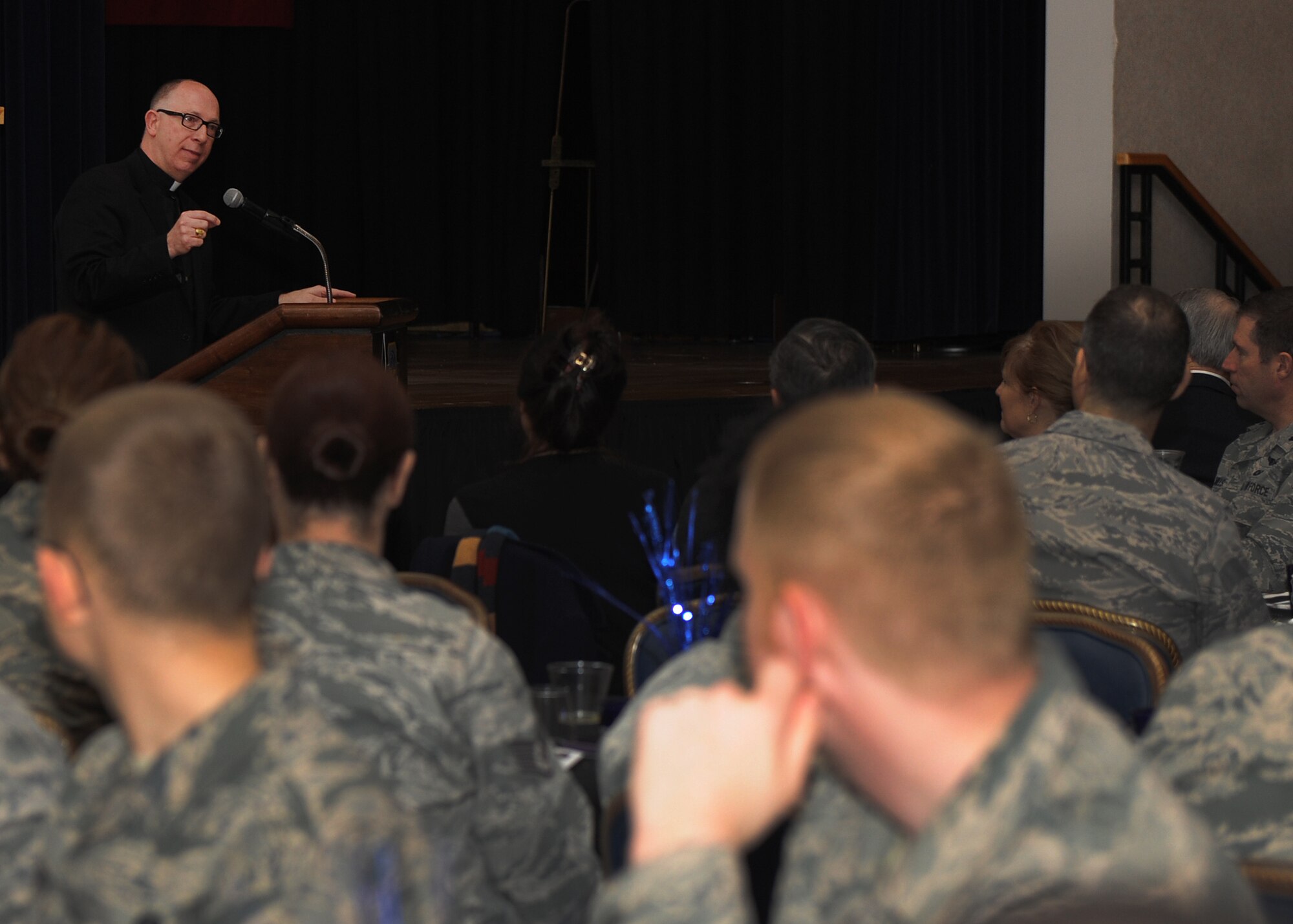 Bishop Michael Jackels, Catholic Diocese of Wichita, speaks to McConnell AFB Airmen at the 2013 McConnell National Prayer Breakfast March 7, 2013, McConnell Air Force Base, Kan. Jackels spoke on the importance of unity, tradition and gathering together. Approximately 300 people attended the annual event. (U.S. Air Force photo/Senior Airman Katrina M. Brisbin)