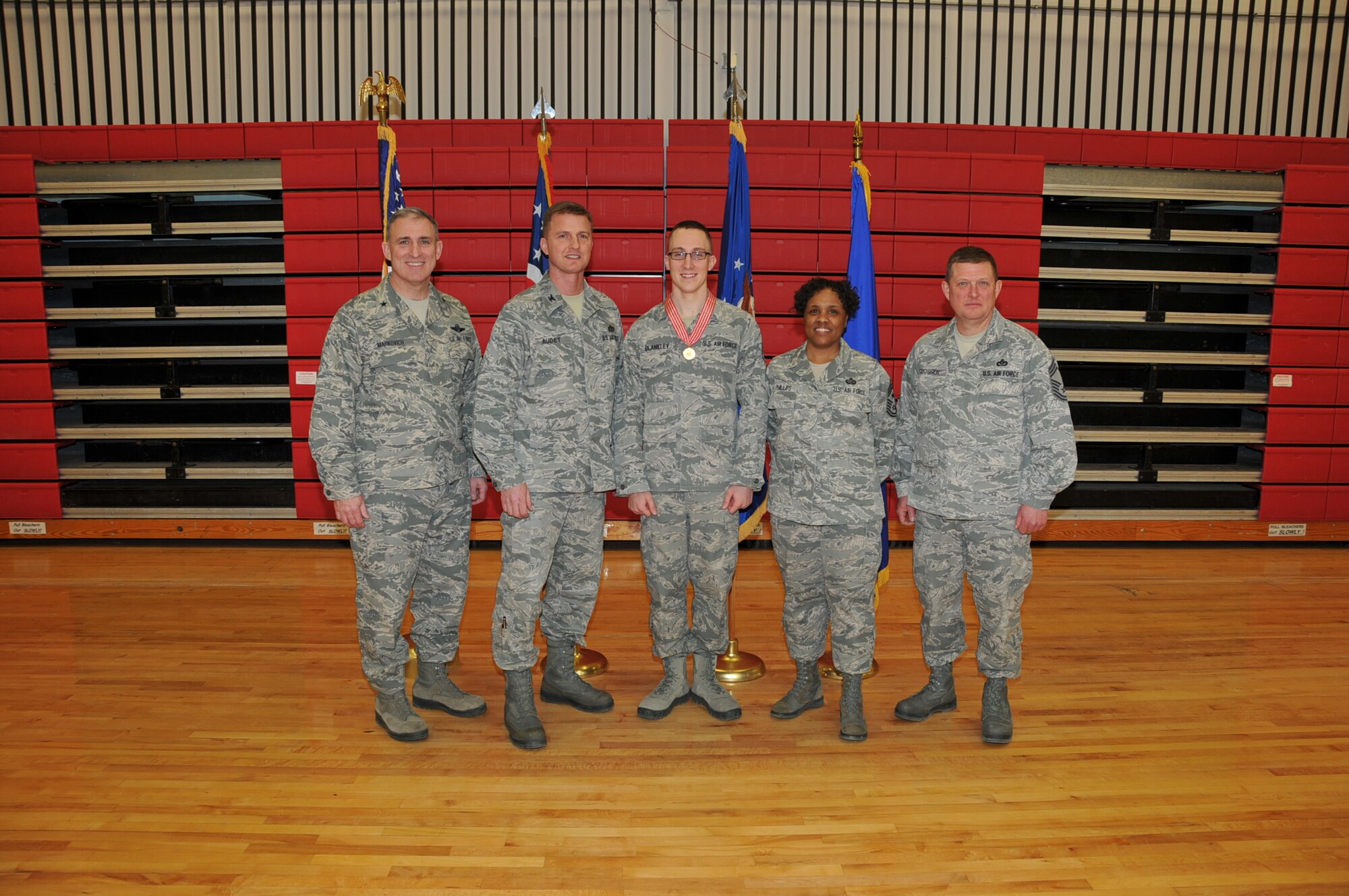 Ohio Air National Guard State Command Chief, Chief Master Sgt. Tamara R. Phillips; Ohio Air National Guard Chief of Staff, Brig. Gen. Stephen E. Markovich; 200th RED HORSE Commander, Col. Todd M. Audet; and Chief Master Sgt. Michael D. Crosser gathered to recognize Blankley’s selfless act of heroism, by awarding him the Ohio Distinguished Service Medal with the "V" device for valor at Camp Perry located in Port Clinton, Ohio on March 9, 2013.  Blankley used his military training to save a life as an impromptu first responder to a traffic accident on June 22, 2012.  (U.S. Air Force photo by Staff Sgt. Joseph Harwood)