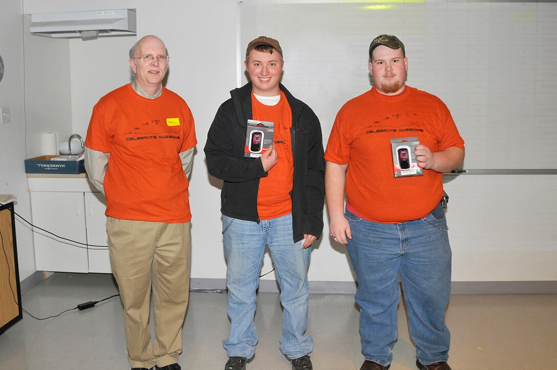 Paul Kelly (left), the National Engineers Week Design Competition coordinator, is shown with third place winners Vincent Caldwell (middle) and Jarred Smith (right) from Shelbyville Central High School. (Photo by Jacqueline Cowan)