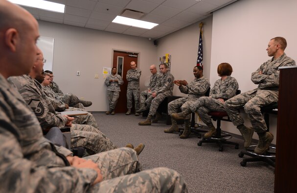 U.S. Air Force Senior Master Sgt. Damon Pettaway, 20th Security Forces Squadron first sergeant, talks to NCOs of Team Shaw at the first sergeants' symposium at Shaw Air Force Base, S.C., March 7, 2013. Shaw NCOs gathered for a first sergeants' symposium where they learned the duties that are associated with the job, received advice, as well as asked questions. (U.S. Air Force photo by Senior Airman Tabatha Zarrella/Released)
