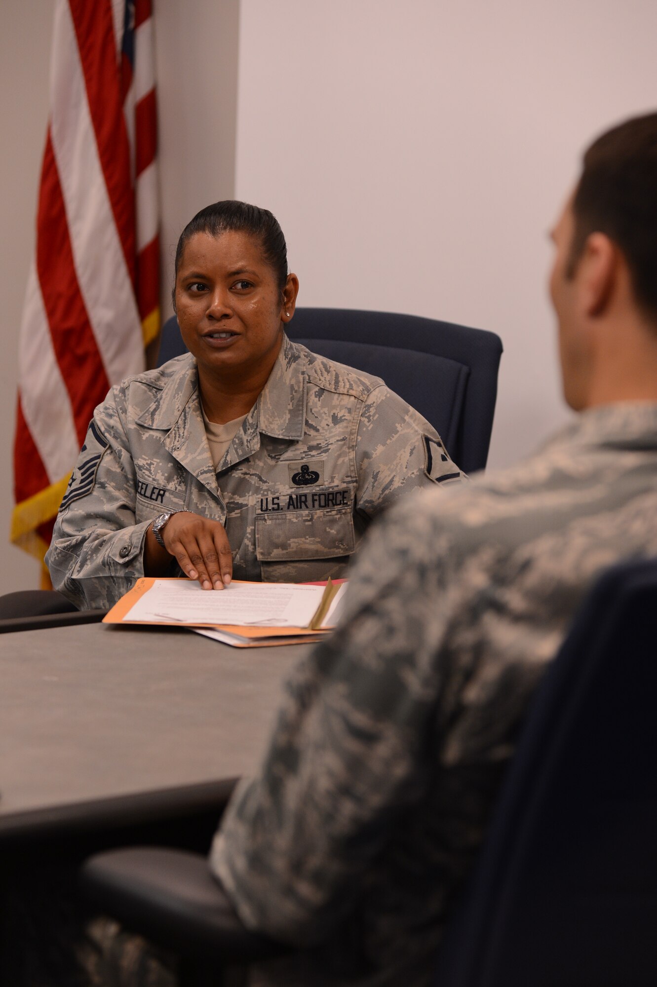 U.S. Air Force Master Sgt. Melissa Wheeler, 20th Equipment Maintenance Squadron first sergeant, shows Team Shaw NCOs the required steps for an Article 15 during a first sergeants' symposium, Shaw Air Force Base, S.C., March 7, 2013. The symposium is for NCOs who are interested in becoming a first sergeant. They learned the duties that are associated with the job, receive advice, as well as asked questions. (U.S. Air Force photo by Senior Airman Tabatha Zarrella/Released)
