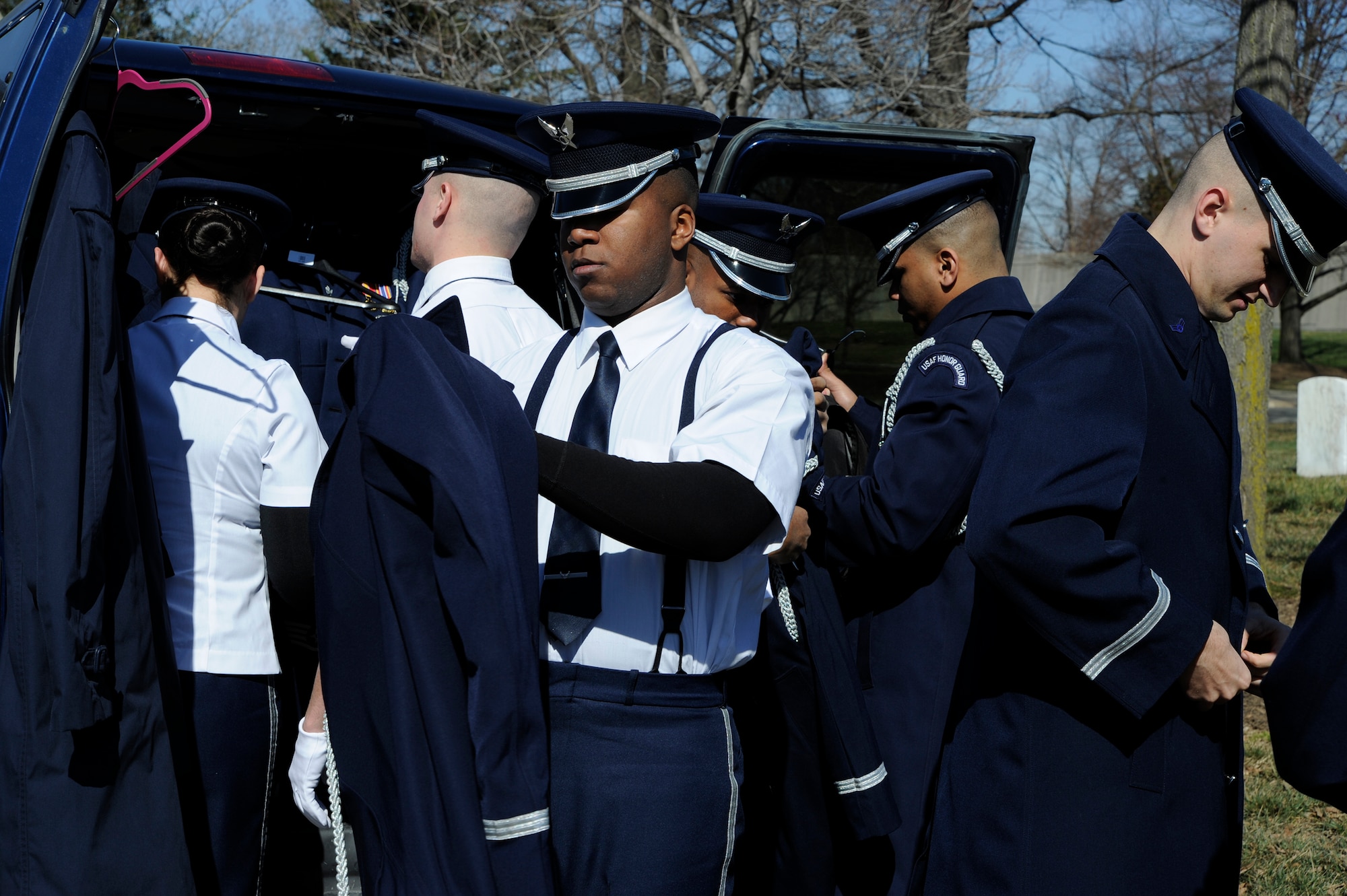U.S. Air Force Honor Guard Body Bearers prepare for a funeral at Arlington National Cemetery March 4, 2013. The eight-person team is responsible for carrying the remains of deceased service members, their dependents, senior and national leaders to their final resting place at Arlington National Cemetery. (U.S Air Force photo by Staff Sgt. Christopher Ruano)