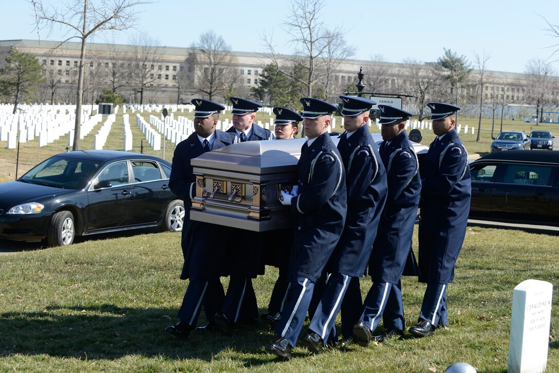 U.S. Air Force Honor Guard Body Bearers carry the casket of our fallen at Arlington National Cemetery March 4, 2013. The eight-person element is responsible for carrying the remains of deceased service members, their dependents, senior and national leaders to their final resting place at Arlington National Cemetery. (U.S Air Force photo by Staff Sgt. Christopher Ruano)