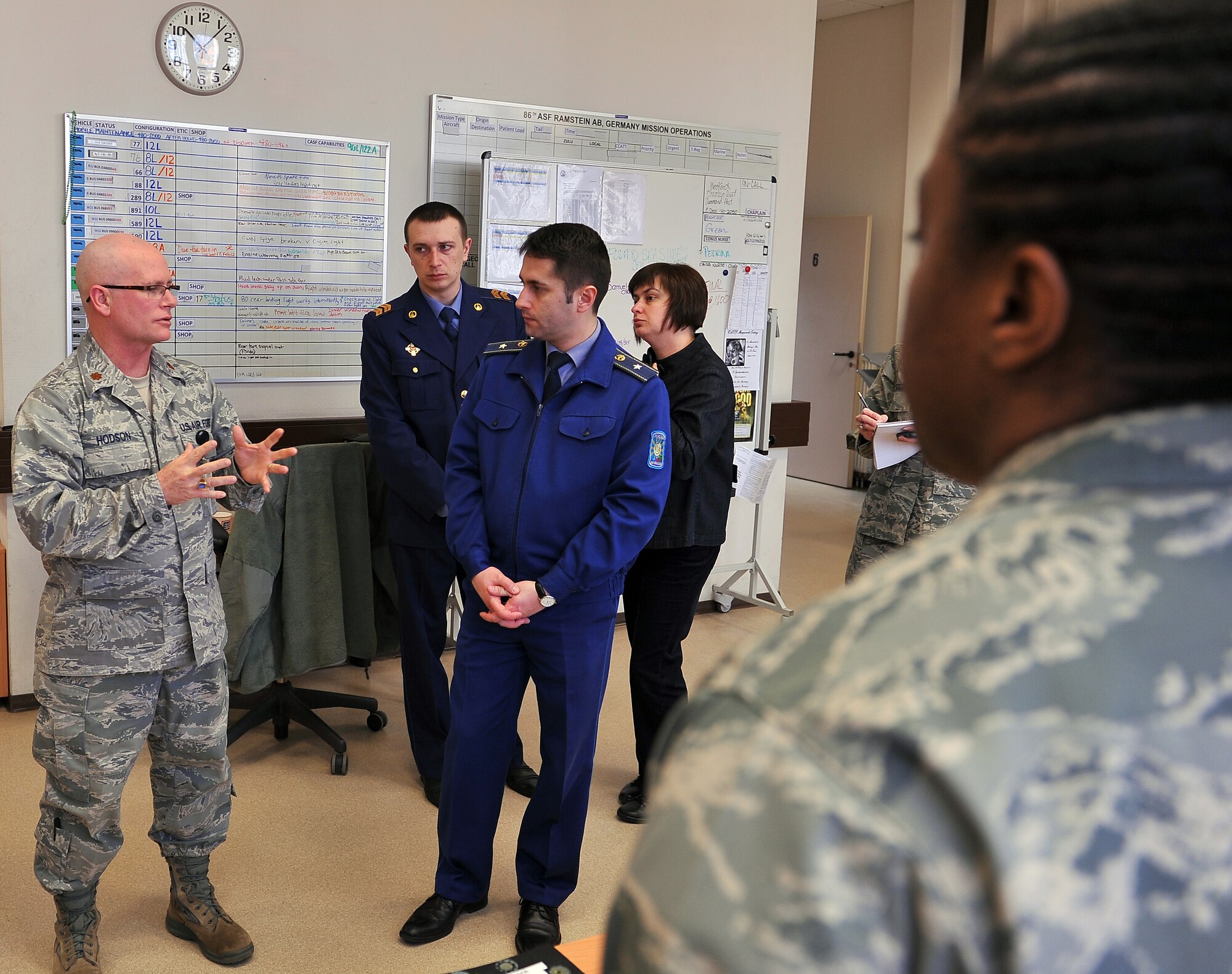 Maj. Wayne P. Hodson, 86th Medical Dental Operations Squadron commander, gives Ukrainian military members a tour of the Contingency Aeromedical Staging Facility, March 5, 2013, Ramstein Air Base, Germany. Members of the Ukrainian military visited the NCO academy to continue their professional military education operations and increase their knowledge in enlisted empowerment and leadership. (U.S. Air Force photo/Airman 1st Class Dymekre Allen)