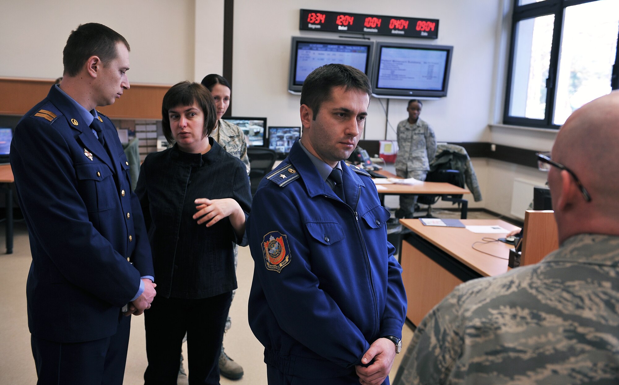 Maj. Wayne P. Hodson, 86th Medical Dental Operations Squadron commander, gives Ukrainian military members a tour of the Contingency Aeromedical Staging Facility, March 5, 2013, Ramstein Air Base, Germany. Members of the Ukrainian military visited the NCO academy to continue their professional military education operations and increase their knowledge in enlisted empowerment and leadership. (U.S. Air Force photo/Airman 1st Class Dymekre Allen)