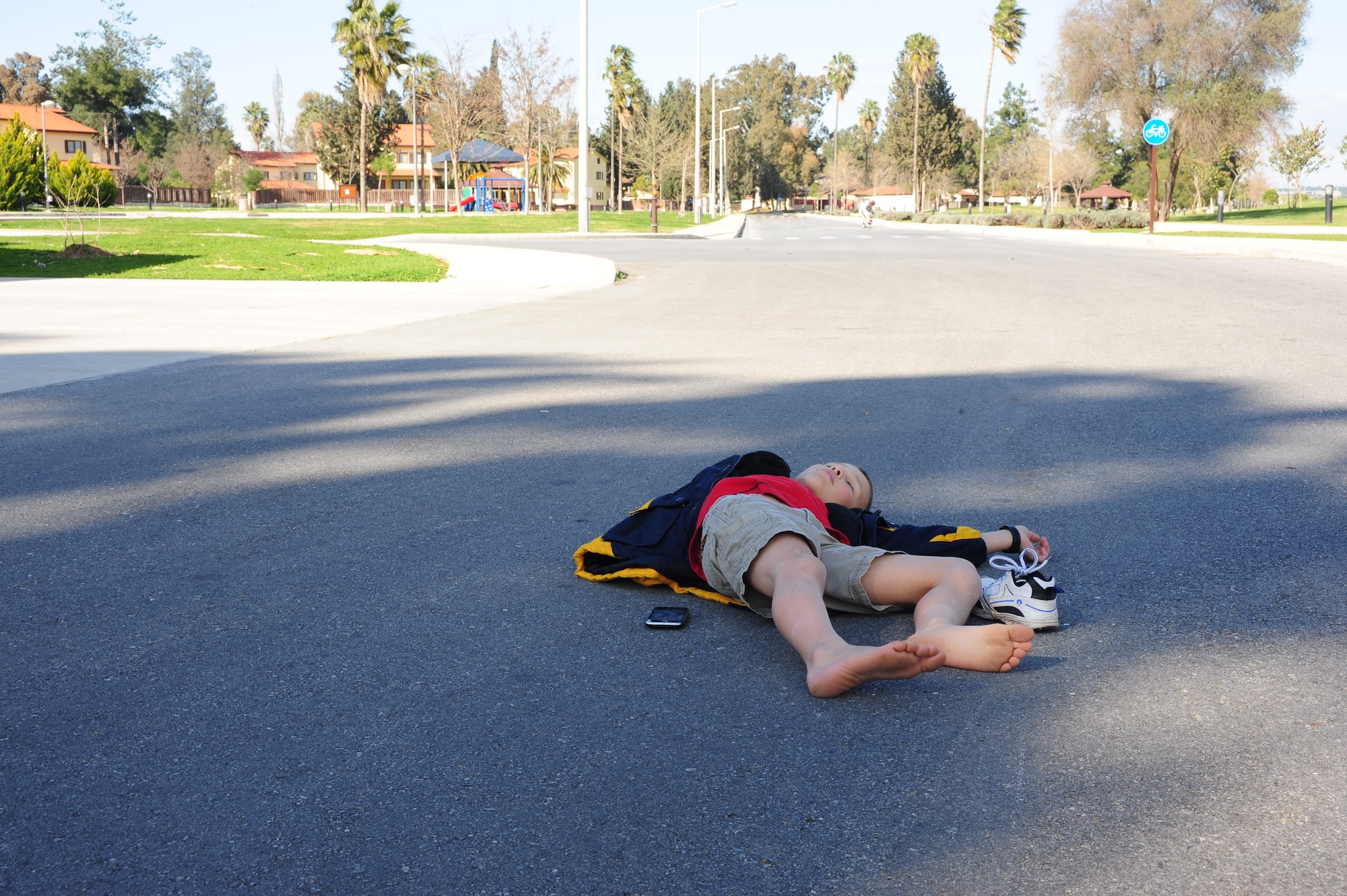 This could be a sight for drivers who speed through housing and/or are not paying attention while driving. Children often play in or near the streets of housing areas, so slow down and watch for pedestrians in housing areas. (U.S. Air Force photo by Senior Airman Anthony Sanchelli/Released)