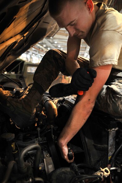 Airman Gage Brunswick, 51st Logistics Readiness Squadron vehicle managment technician, works to replace a front main seal on a Ford F350 at the VM main shop at Osan Air Base, Republic of Korea, March 12, 2013. Brunswick is one of 134 personnel assigned to maintain the Pacific Air Force’s second largest vehicle fleet of the almost 1,500 vehicles. (U.S. Air Force photo/Senior Airman Alexis Siekert)