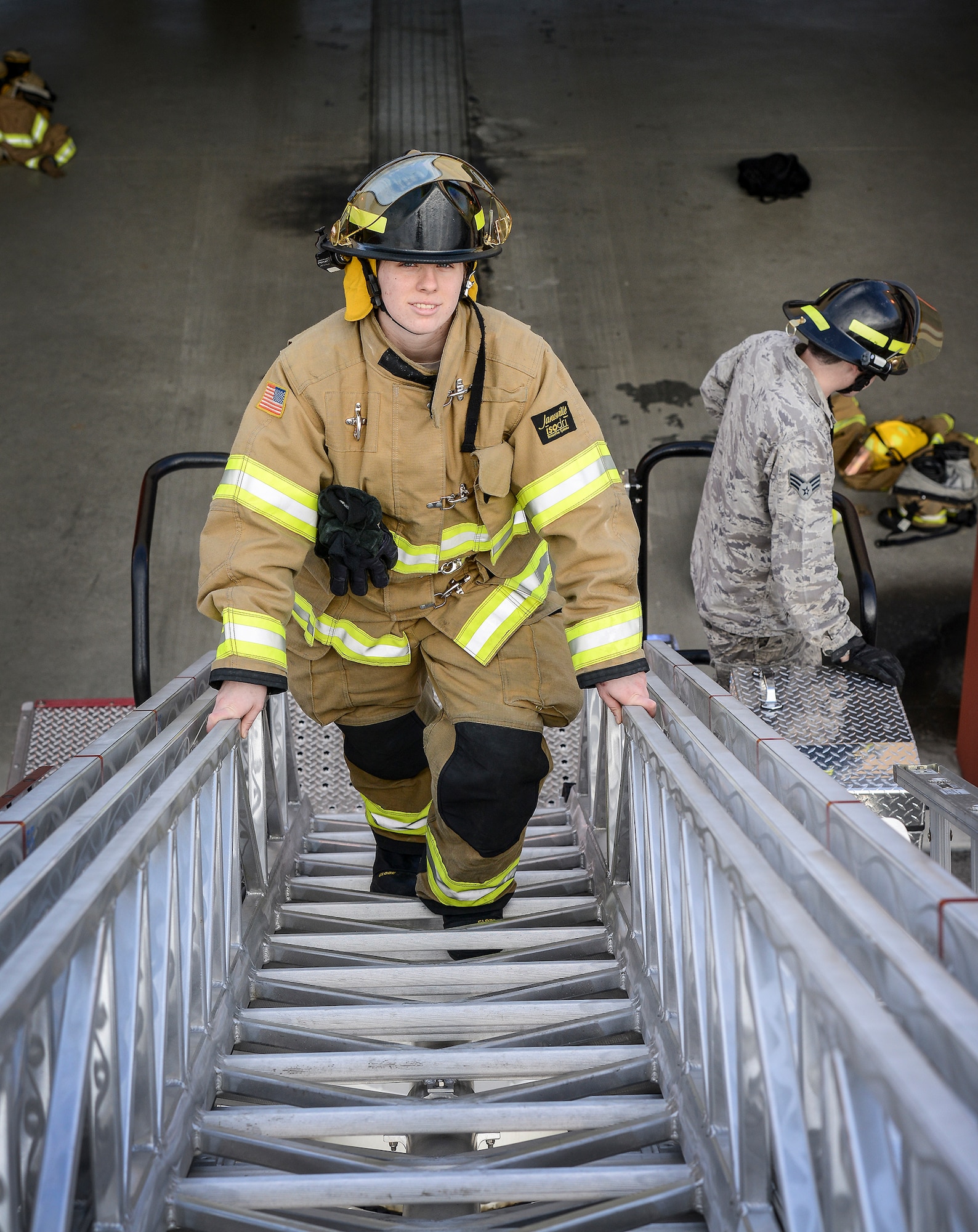 Airman 1st Class Emily Beckerjeck is a firefighter with the 31st Civil Engineer Squadron and is one of a number of women currently serving in non-traditional career fields at Aviano Air Base, Italy. As a firefighter, Beckerjeck responds to aircraft, airfield and structural fires, hazardous material incidents, search and rescue missions and the many everyday tasks required of any male firefighter, to include carrying gear that can weigh up to 75 pounds. (U.S. Air Force photo/Senior Airman Katherine Tereyama)