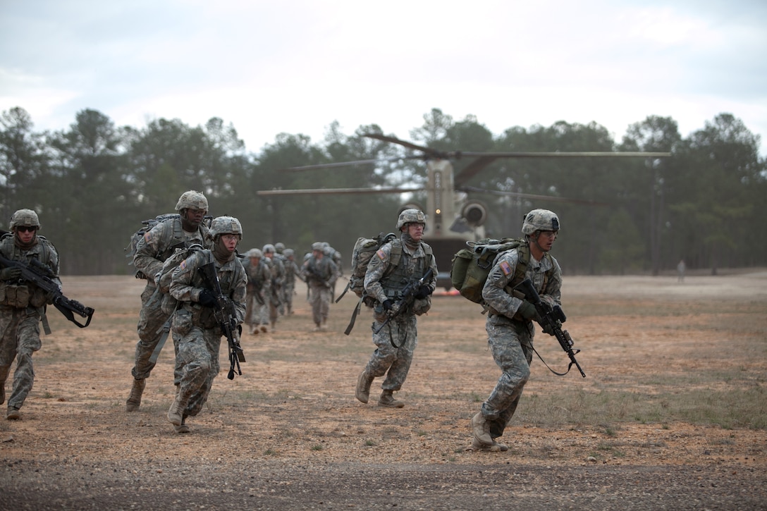 Army Staff Sgt. Daniel A. Hansen, Sgt. Nicholas G. Gonnion and Spcs ...