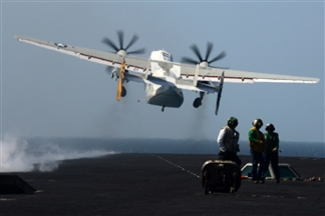 A U.S. Navy C-2A Greyhound launches from the flight deck of the aircraft carrier USS John C. Stennis (CVN 74) during flight operations on March 9, 2013.  The Greyhound is attached to Fleet Combat Logistics Support Squadron 30.  The Stennis is deployed to the 5th Fleet area of responsibility to conduct maritime security operations and theater security cooperation efforts.  