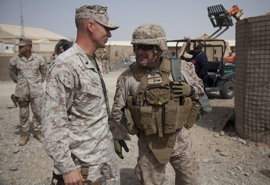 U.S. Marine Corps Col. Austin E. Renforth, right, commanding officer,  Regimental Combat Team (RCT) 7, says goodbye to Lt. Col. Carl E. Cooper, right, battalion commander, 3rd Battalion, 9th Marines, RCT-7 on Forward Operating Base Geronimo, Helmand province, Afghanistan, March 12, 2013. The Senior leadership was visiting the outpost as part of a battle field circulation to ensure operational readiness and efficiency. (U.S. Marine Corps photo by Cpl. Kowshon Ye/Released)