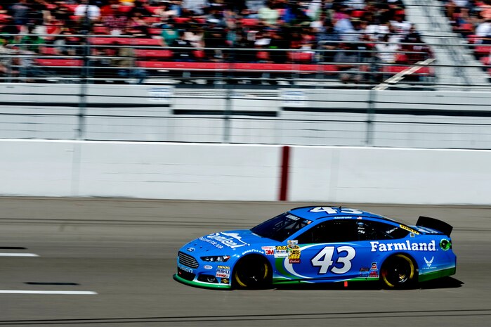 The #43 car, driven by Aric Almirola, races around the Las Vegas Motor Speedway during the Kobalt Tools 400 Mar. 10, 2013, in Las Vegas, Nev. Almirola was born on March 14, 1984 on Eglin Air Force Base. (U.S. Air Force photo by Airman 1st Class Christopher Tam)