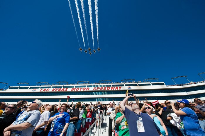 The U.S. Air Force Demonstration Squadron, Thunderbirds, fly over the Las Vegas Motor Speedway during the opening ceremonies of the Kobalt Tools 400 Mar. 10, 2013, in Las Vegas, Nev. This is the Thunderbirds last fly over for a public event this fiscal year due to sequestration cuts. (U.S. Air Force photo by Airman 1st Class Christopher Tam)