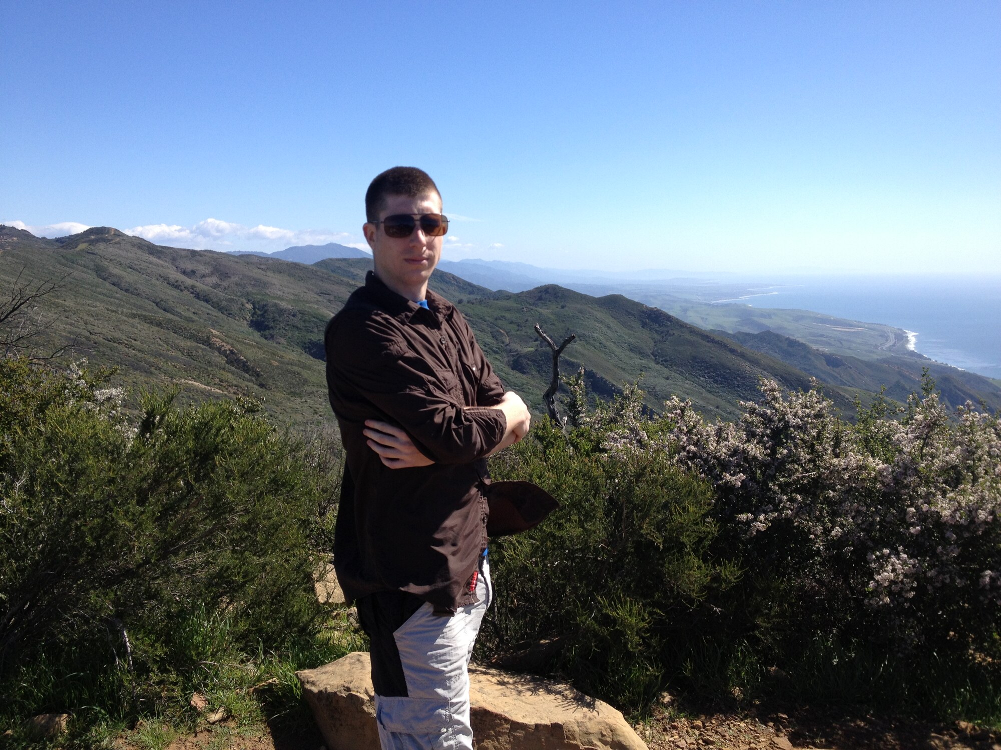 Senior Airman Karl Sternitzky, 576th Flight Test Squadron, poses at the top of Gaviota Peak March 9 during a hike organized by Vandenberg's Outdoor Recreation Office as part of their Single Airman Initiative Program. (Courtesy photo)