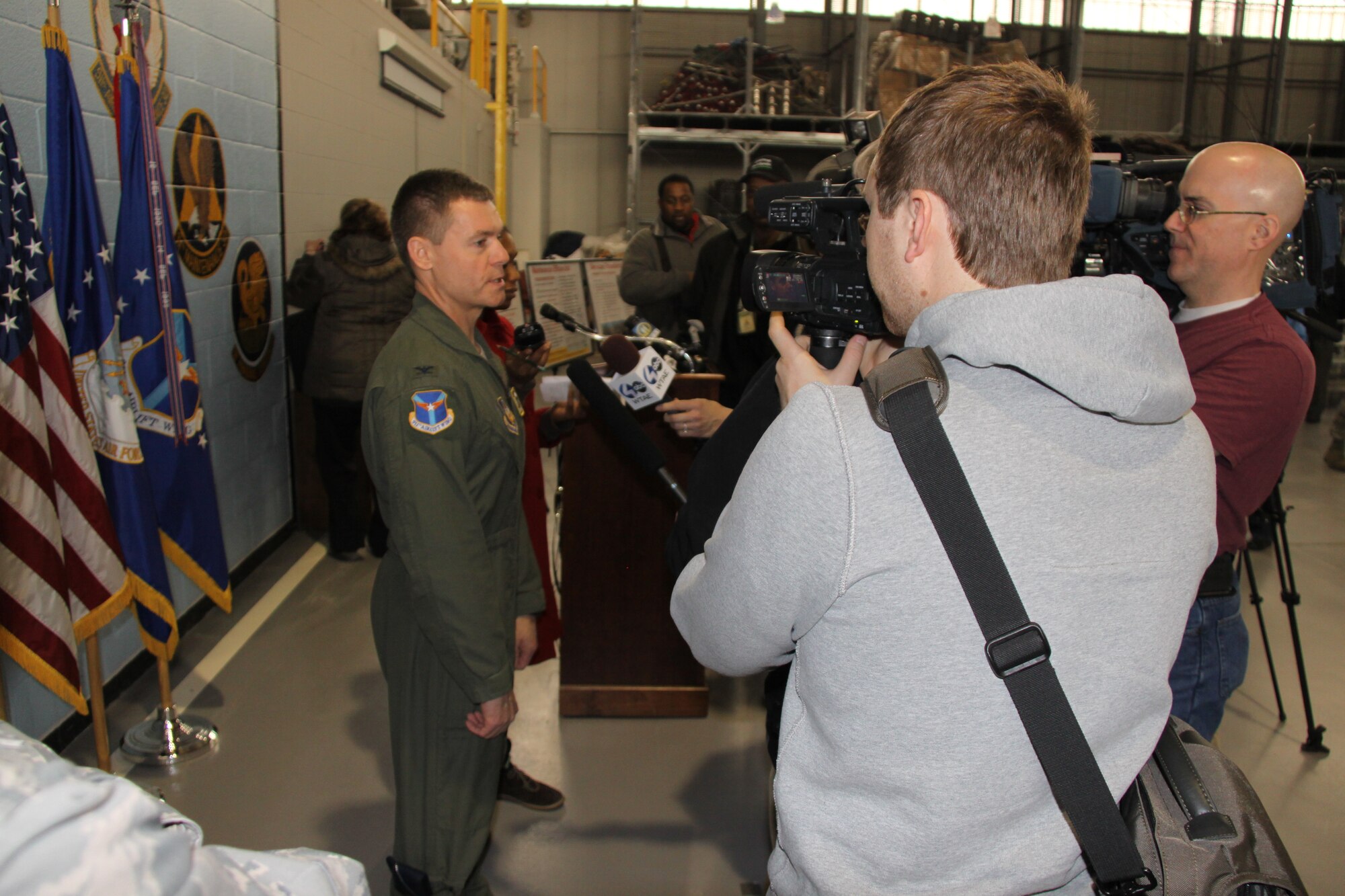 Col. Craig C. Peters, 911th Airlift Wing commander, addresses the media after a civilian commander’s call where he announced the Intra-theater Working Group’s decision to restore the Air Reserve Station’s eight aircraft and associated personnel through fiscal year 2014. One of the criteria evaluated by the ITWG and considered by the Secretary of the Air Force was the restoral of aircraft to those units adversely impacted by the FY 13 President’s Budget.  (U.S. Air Force photo by Master Sgt. Mark A. Winklosky/Released)