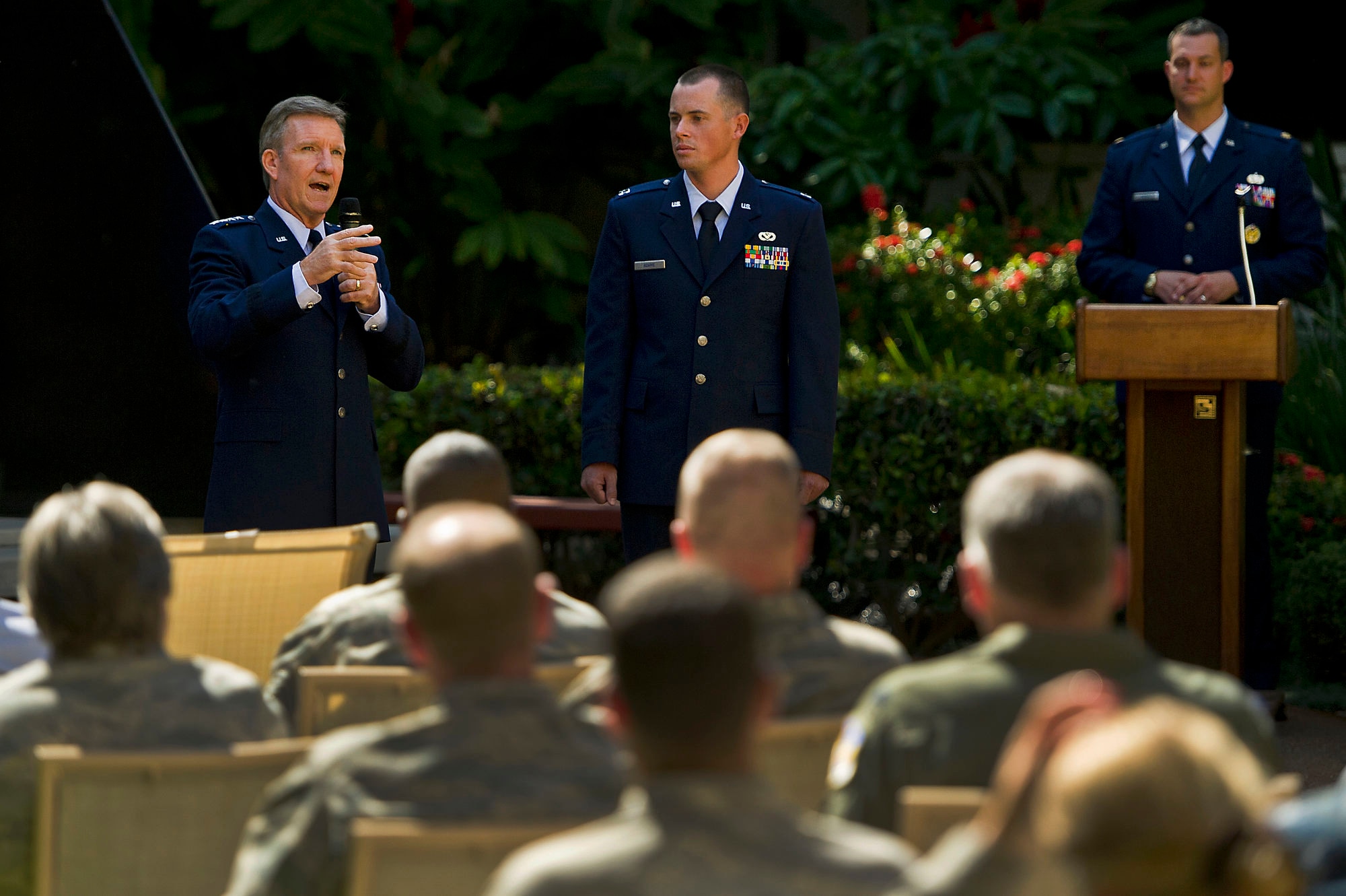 U.S. Air Force Gen. Hawk Carlisle, Pacific Air Forces commander, presents Capt. Matt Adams, 647th Air Base Group, the Airman's Medal for heroism involving voluntary risk of life at Nauyaca Waterfalls, Platanillo, Costa Rica, Jan. 1, 2011.  On that date, Adams witnessed another officer fall from a 25-foot cliff, landing on the rocks below and hitting his head and back before sinking to the bottom of a pool below the waterfall.  With complete disregard for his own safety, he dove from the same cliff and over the boulders below to swim down 20 feet to the bottom of the pool where he located the unconscious victim and transported him to shore. (Department of Defense photo by U.S. Air Force Tech. Sgt. Michael R. Holzworth/Released)