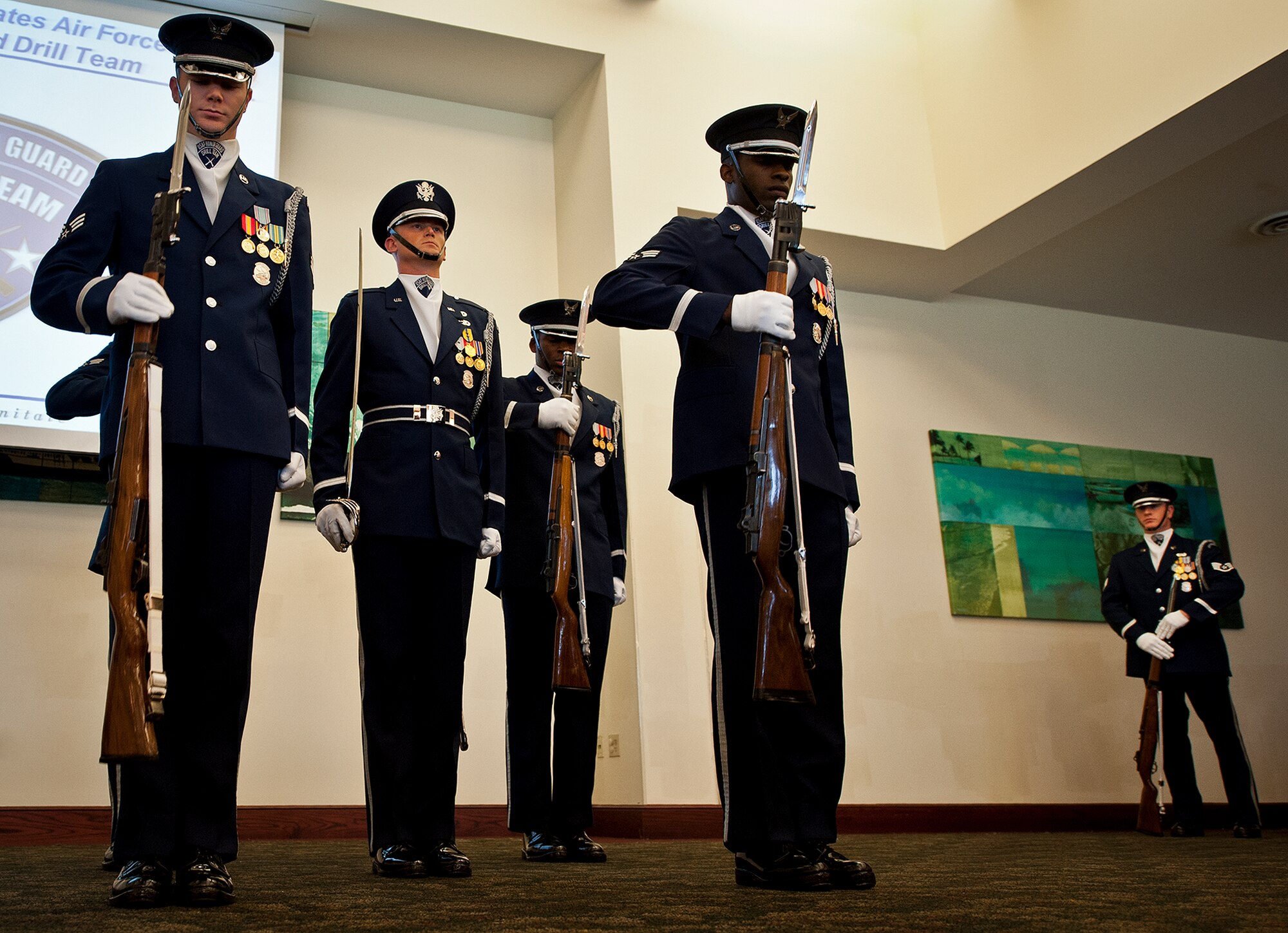 Members of the Air Force Honor Guard perform a rifle routine March 12 at Eglin Air Force Base, Fla.  The team visited the base to highlight their program and find interested Airmen who may be interested in joining.  After the performance, the group spoke about the requirements to become a member and answered questions from the audience.  (U.S. Air Force photo/Samuel King Jr.)