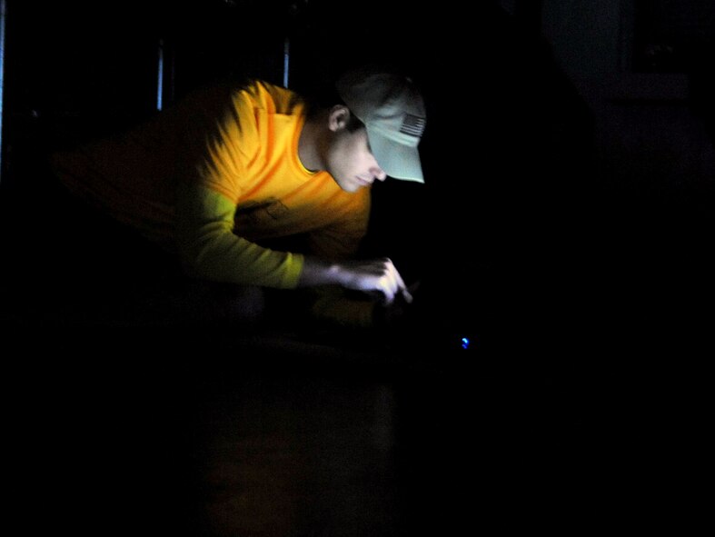 A student from Air Command and Staff College checks on his next leg of the ACSC Warrior Relay from Maxwell Air Force Base in Montgomery, Ala., to MacDill Air Force Base in Tampa, Fla., March 8. Team members slept in National Guard Armories in between legs for a few hours during the night. (U.S. Air Force photo by Master Sgt. Michael Voss) 